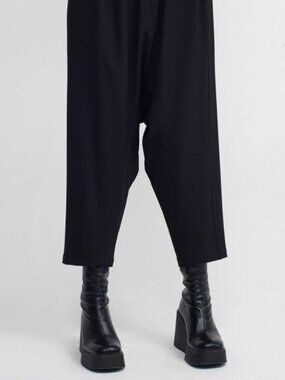 Nu pleated drop-crotch Barrel trousers by the contemporary designer label NU